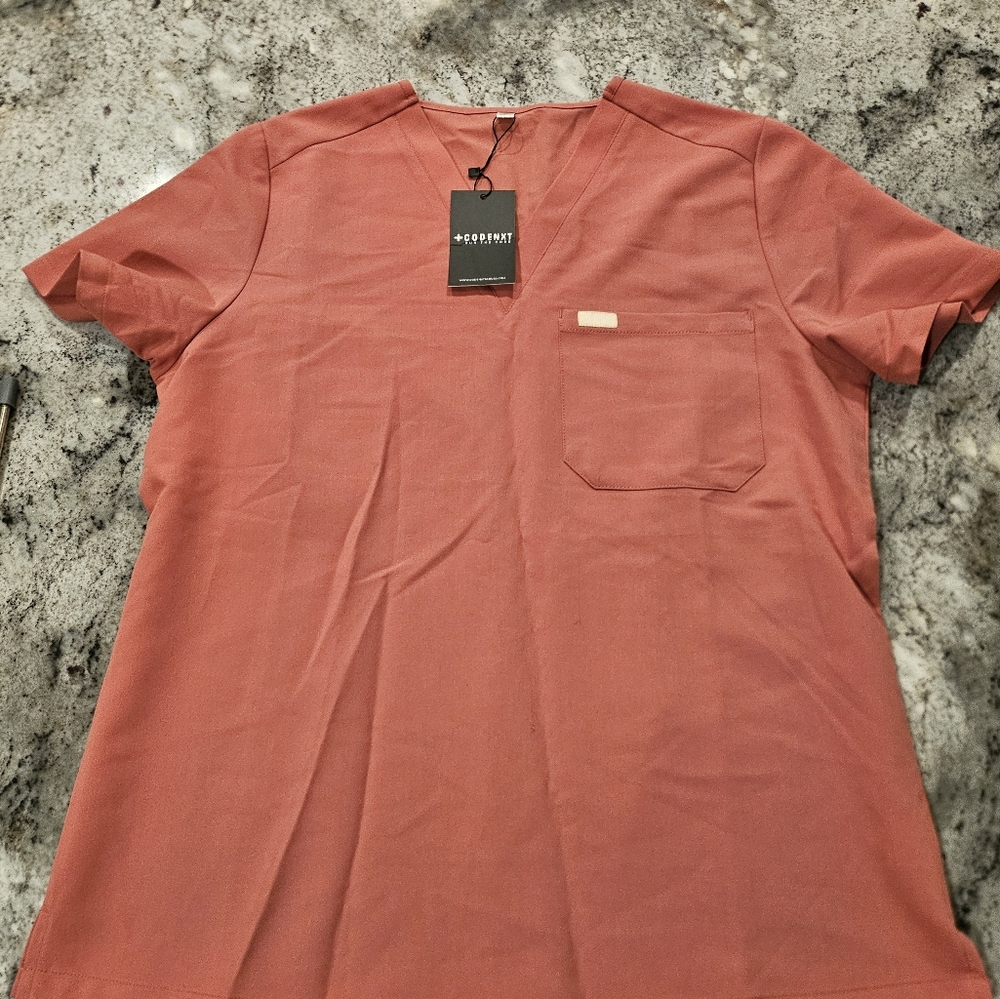 Code next peach scrub top and flare scrub pants set
